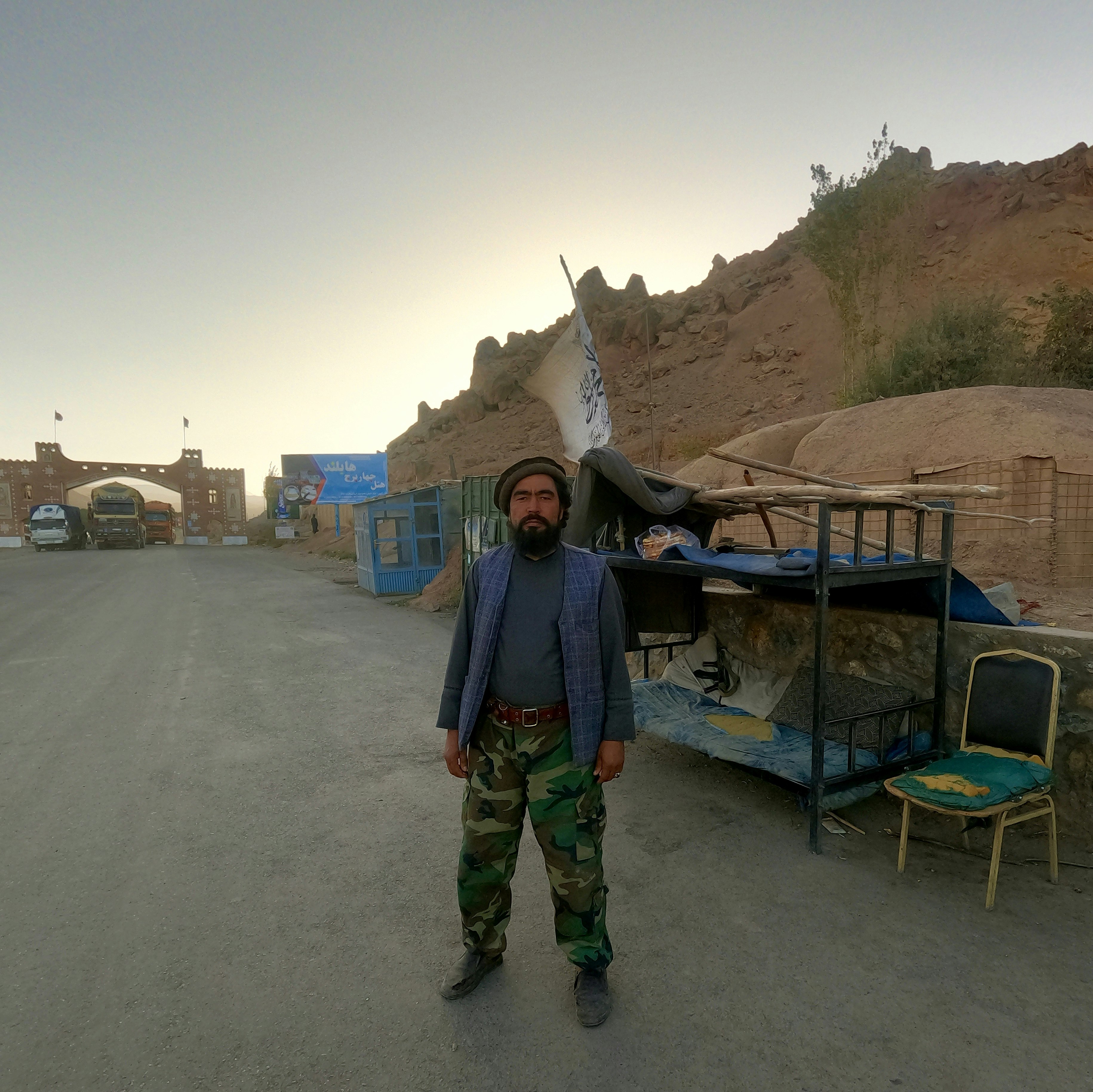 A Taliban soldier and the checkpoint he controls